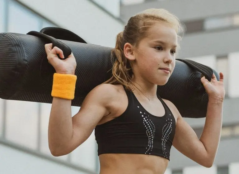 Girl gymnast training with AquaBag